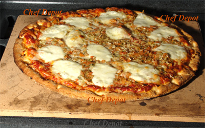 Pizza Stone - Baking Stone sitting on bottom of the gas oven, used over 1000 times in 10 years